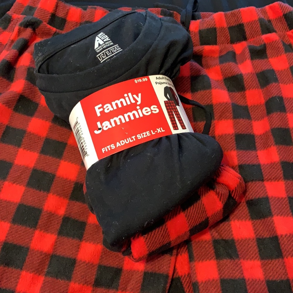 Brand new in package “Family Jammies”Fits adult L-XL 100% polyester top/bottom
